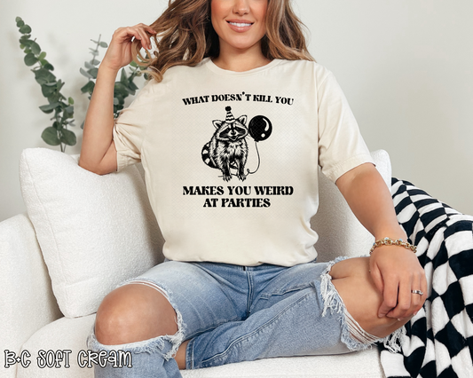 What Doesn't Kill You Makes You Weird At Parties Raccoon DTF TRANSFER