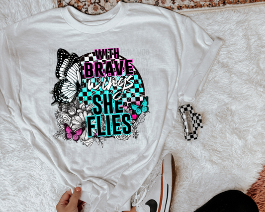 With Brave Wings She Flies